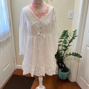 Maternity V Neck Lantern
Sleeve Knot Front Ruffle Hem Schiffy
Dress